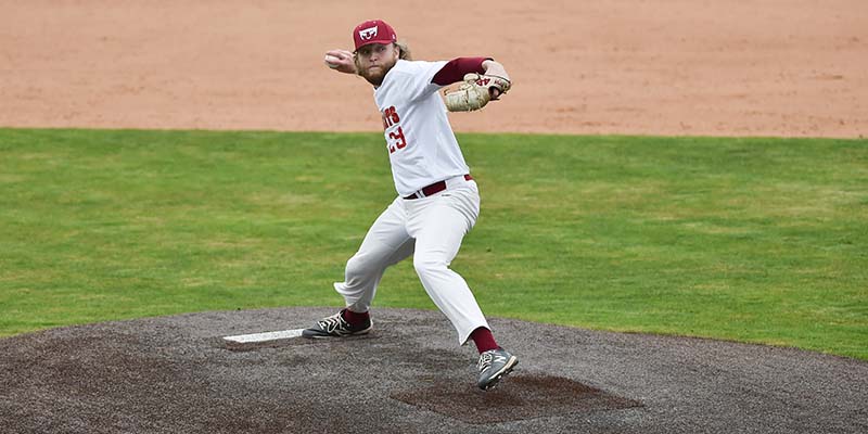 Brady Joyner begins his pitching motion for Willamette.