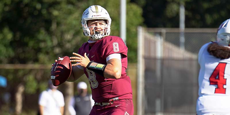 Aidan Kuykendall prepares to pass the ball while looking for an open receiver.