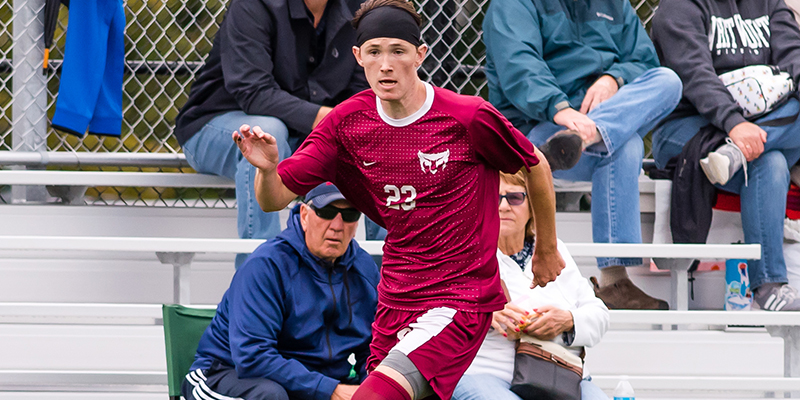 Mack van der Velde controls the soccer ball for the Bearcats.