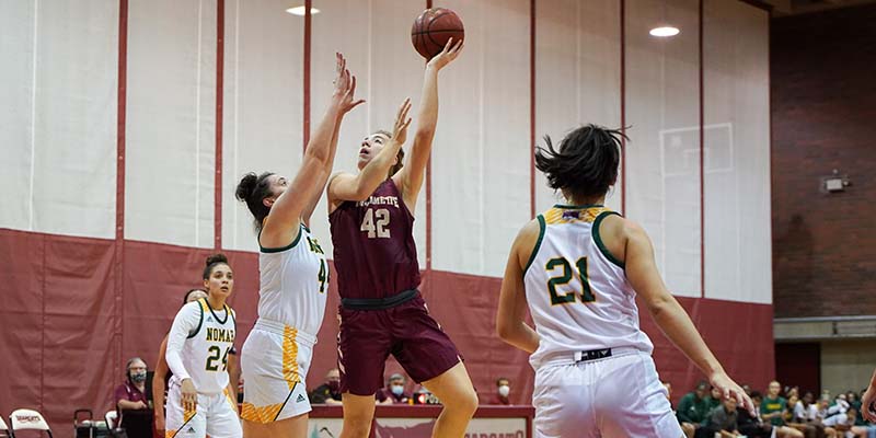 Ava Kitchin releases a hook shot.